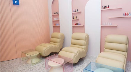 Stylish pedicure chairs at Lunch Break Beauty in Makati, Metro Manila, PH, showcasing a plush, relaxing ambiance.