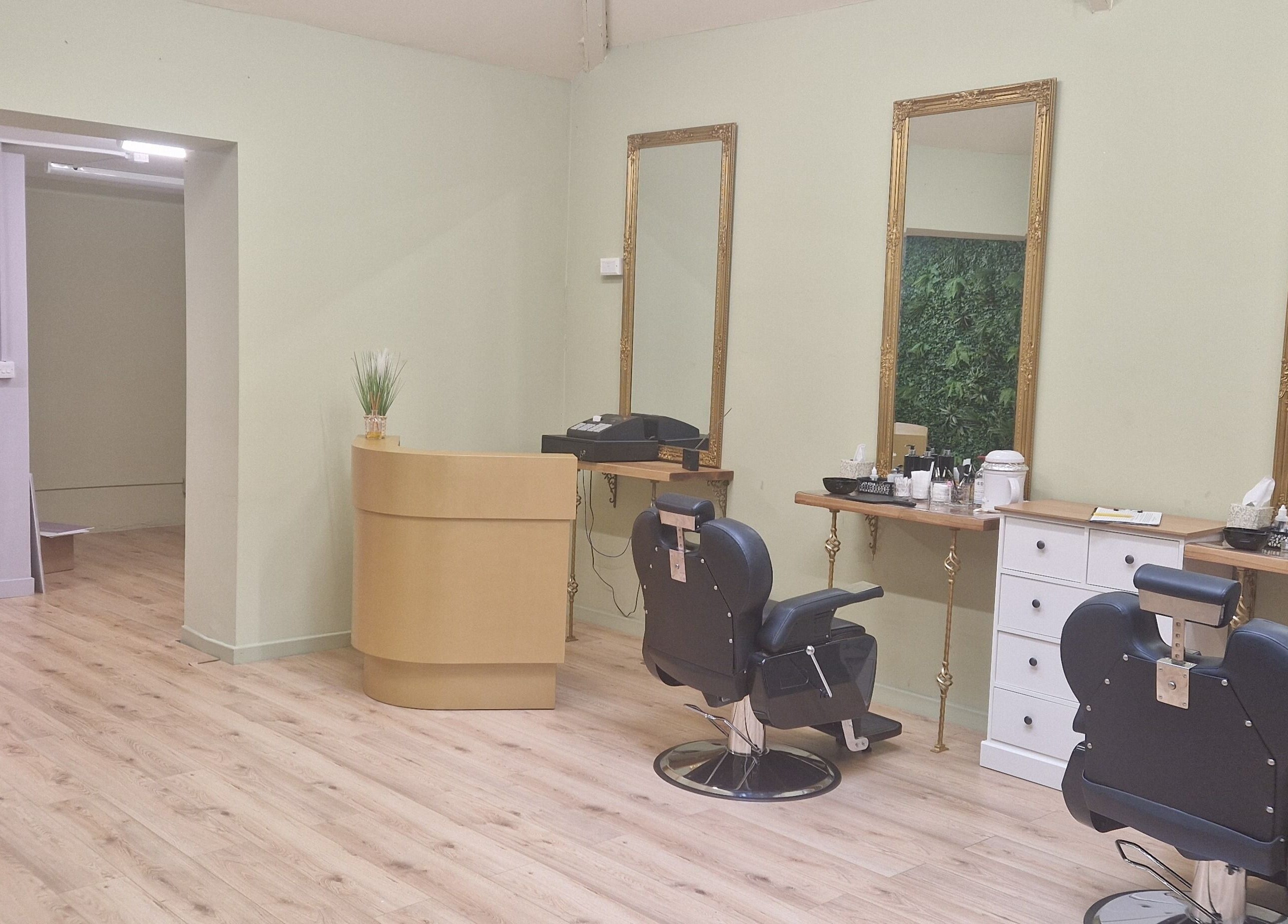 Interior of Lia Brow Bar in Newcastle upon Tyne, England, GB featuring salon chairs and mirrors.