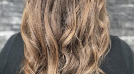 Beautiful wavy hairstyle at Hair by Clementine, Rotorua, Bay Of Plenty Region, NZ, showcasing elegant hair texture.