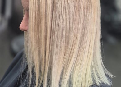 Sleek blonde hairstyle at Hair by Clementine in Rotorua, Bay Of Plenty Region, NZ salon.