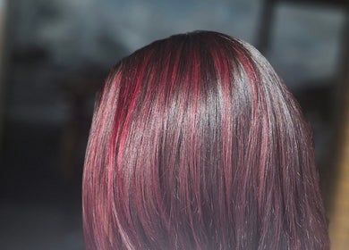 Glossy maroon hair expertly styled at Hair by Clementine, Rotorua, Bay Of Plenty Region, NZ.