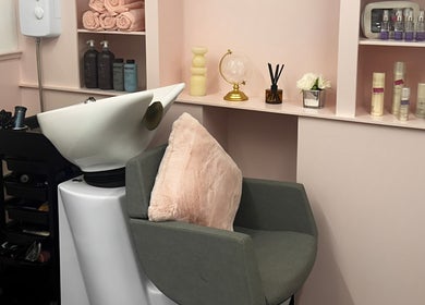 Modern wash station and products at Courtney Louise Hair Studio, Northampton, England, GB. Elegant and inviting space.