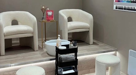 Chic nail area at The Spa Lounge By Katie H in Stourbridge, England. Features plush chairs for a relaxing experience.