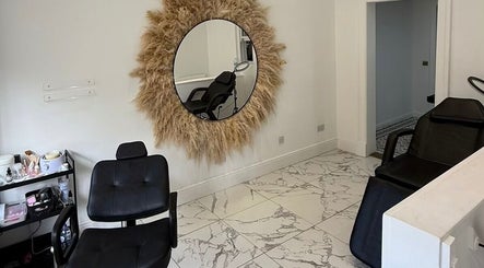 Modern salon seating at The Brow & Lash Lab ByElle, Edinburgh, Scotland, GB featuring stylish decor.