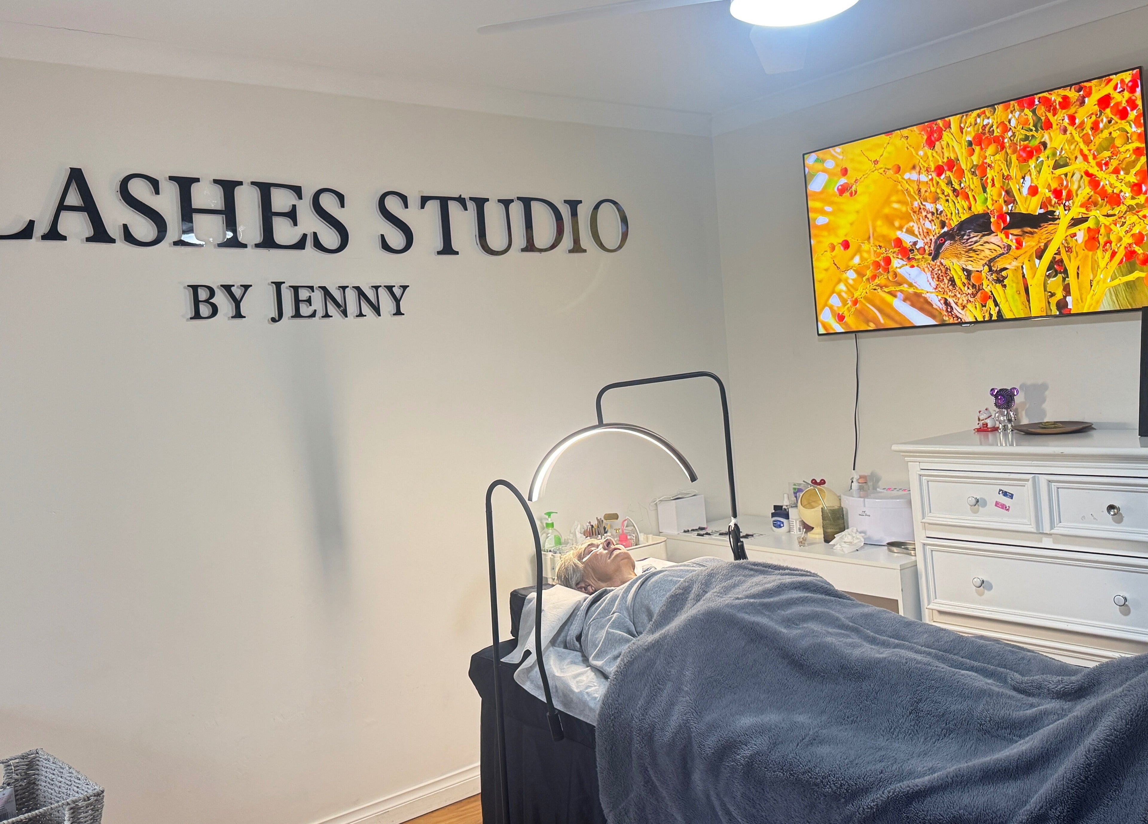Relaxing setup at Lash Studio By Jenny, Bertram, Western Australia, AU with client in cozy treatment area.