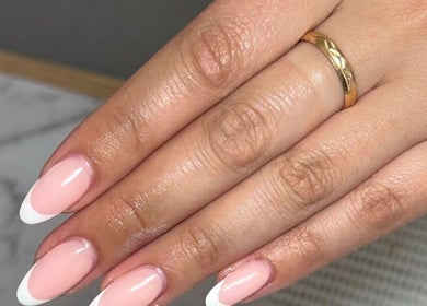 Beautifully manicured French nails at Neash Beauty, Kiama, New South Wales, AU, showcasing expert nail care.