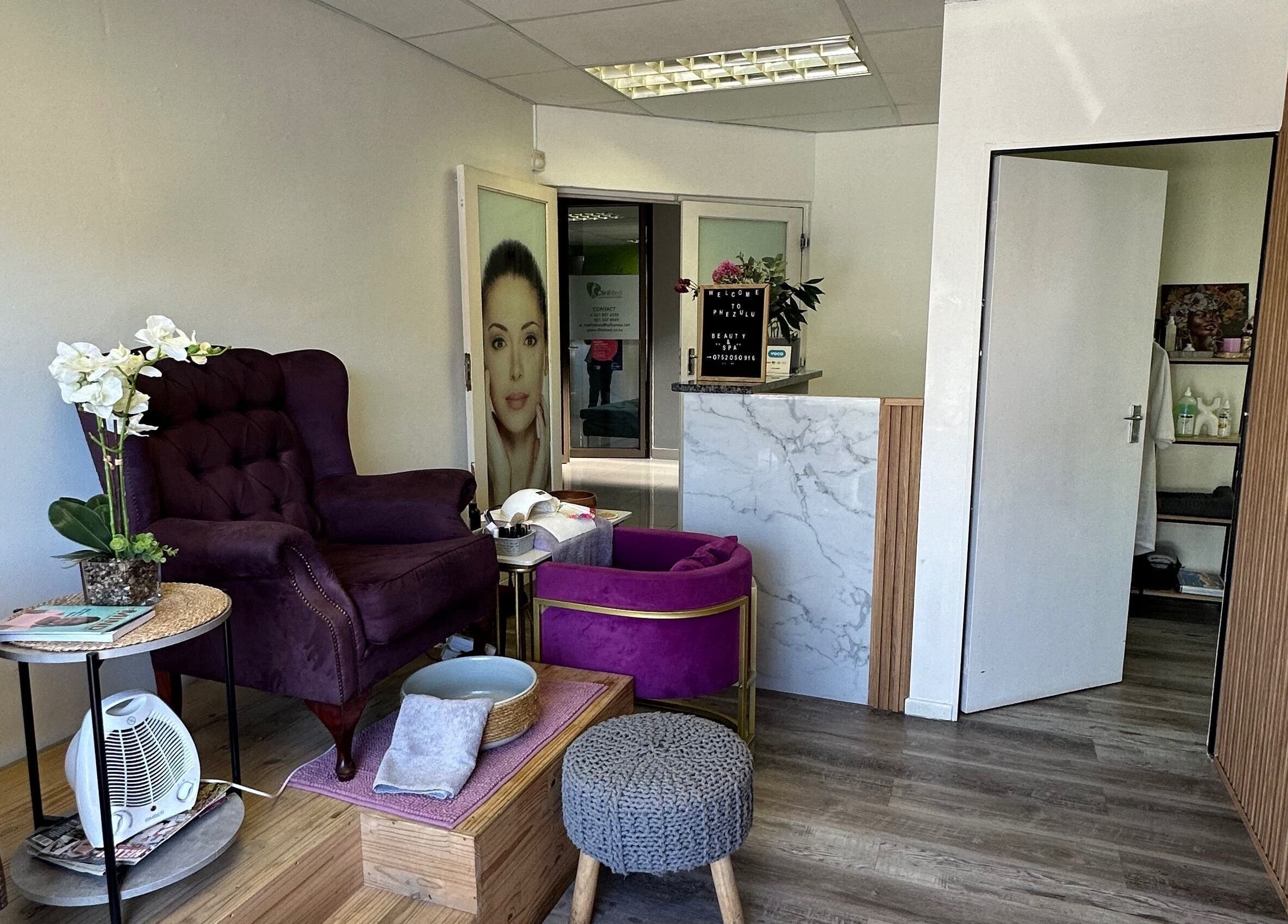 Elegant interior of Phezulu beauty and spa in Cape Town, Western Cape, ZA showcasing plush seating and welcoming decor.