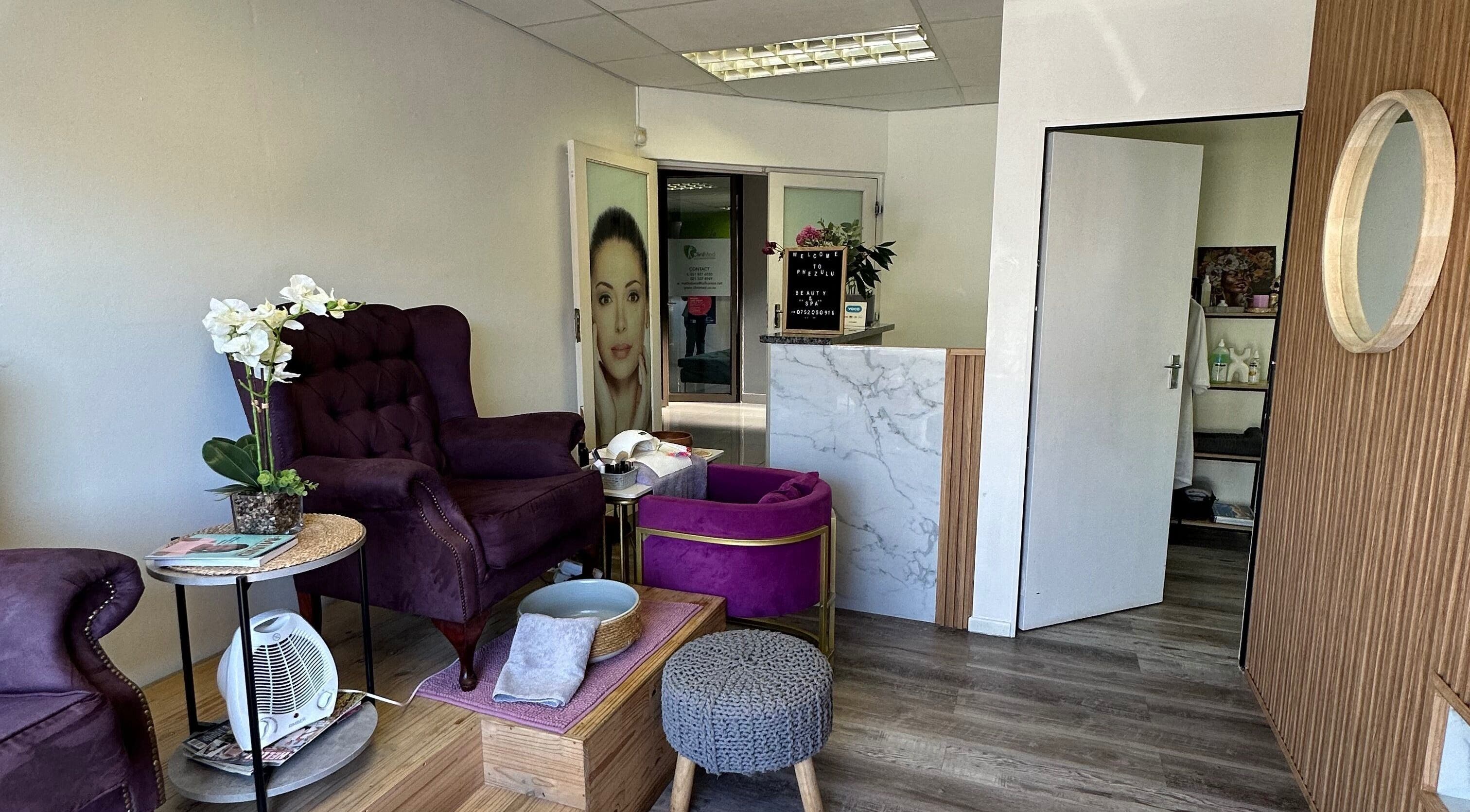 Elegant interior of Phezulu beauty and spa in Cape Town, Western Cape, ZA showcasing plush seating and welcoming decor.