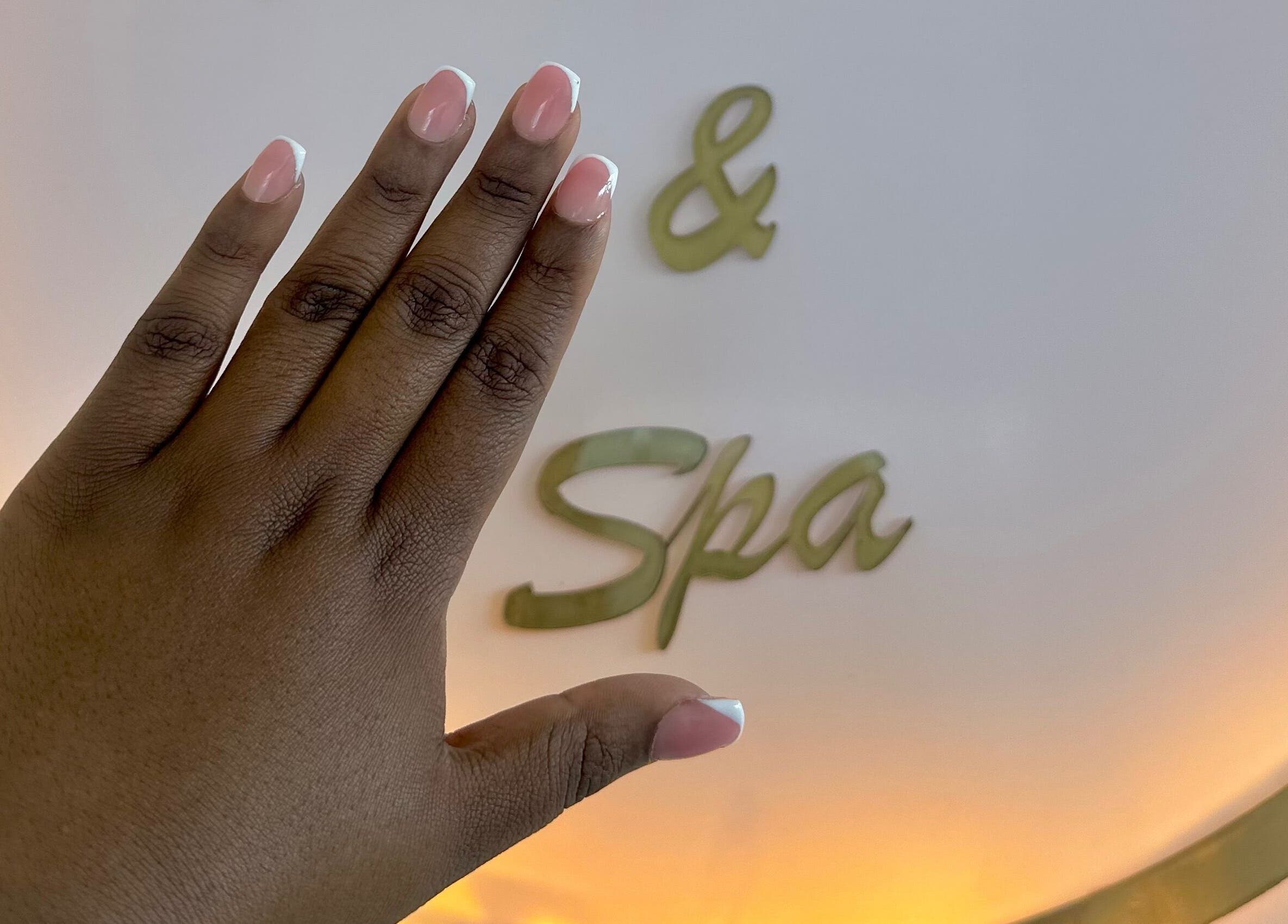 Manicured hand showcasing nails at Phezulu beauty and spa, Cape Town, Western Cape, ZA.