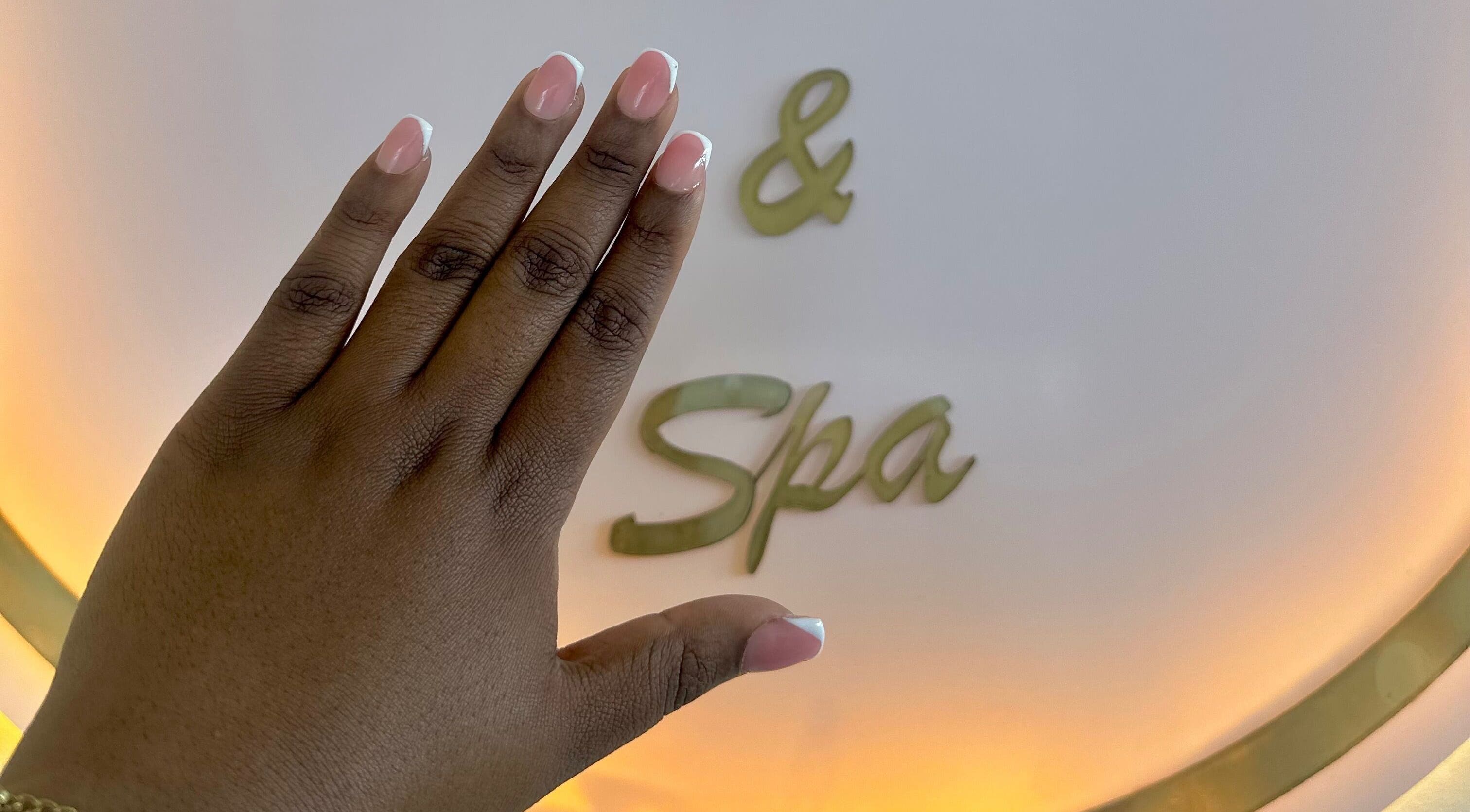 Manicured hand showcasing nails at Phezulu beauty and spa, Cape Town, Western Cape, ZA.