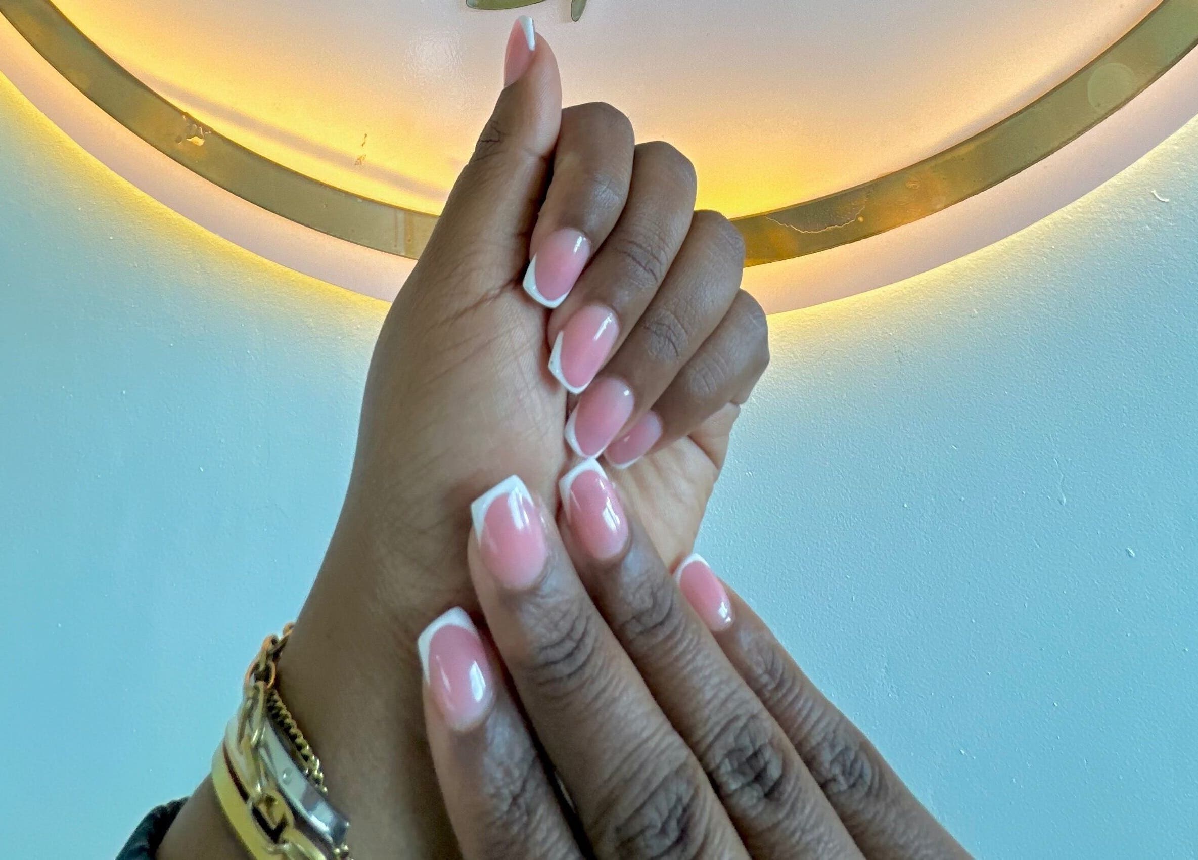Elegant French manicure at Phezulu beauty and spa, Cape Town, Western Cape, ZA.