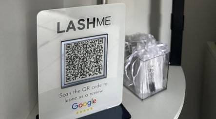 QR code for reviews at Lash Me in Hounslow, England, GB, displayed on a counter.