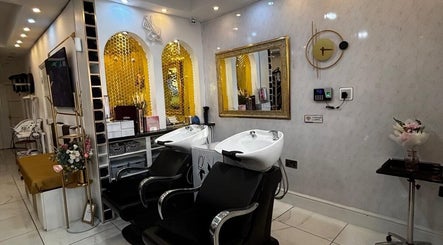 Interior of Inspiration Nail, Hair and Beauty salon, Isleworth, England, GB with stylish hair washing stations.