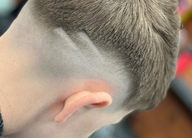 Close-up of a styled fade haircut at Ultimate Crown Barber, Forest Hall, England, GB.