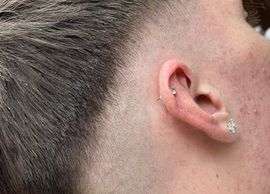 Close-up of a trendy undercut haircut at Ultimate Crown Barber in Forest Hall, England, GB.