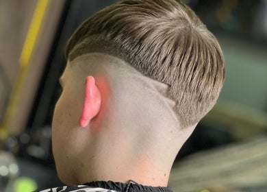 Close-up of a precise fade haircut at Ultimate Crown Barber, Forest Hall, England, GB.