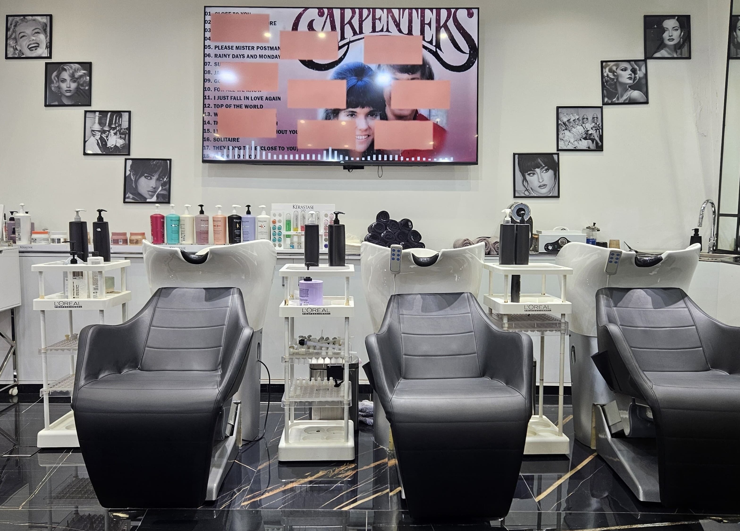 Chic salon interior at Top Style Ladies Saloon, Dubai, AE with sleek wash stations and classic decor.