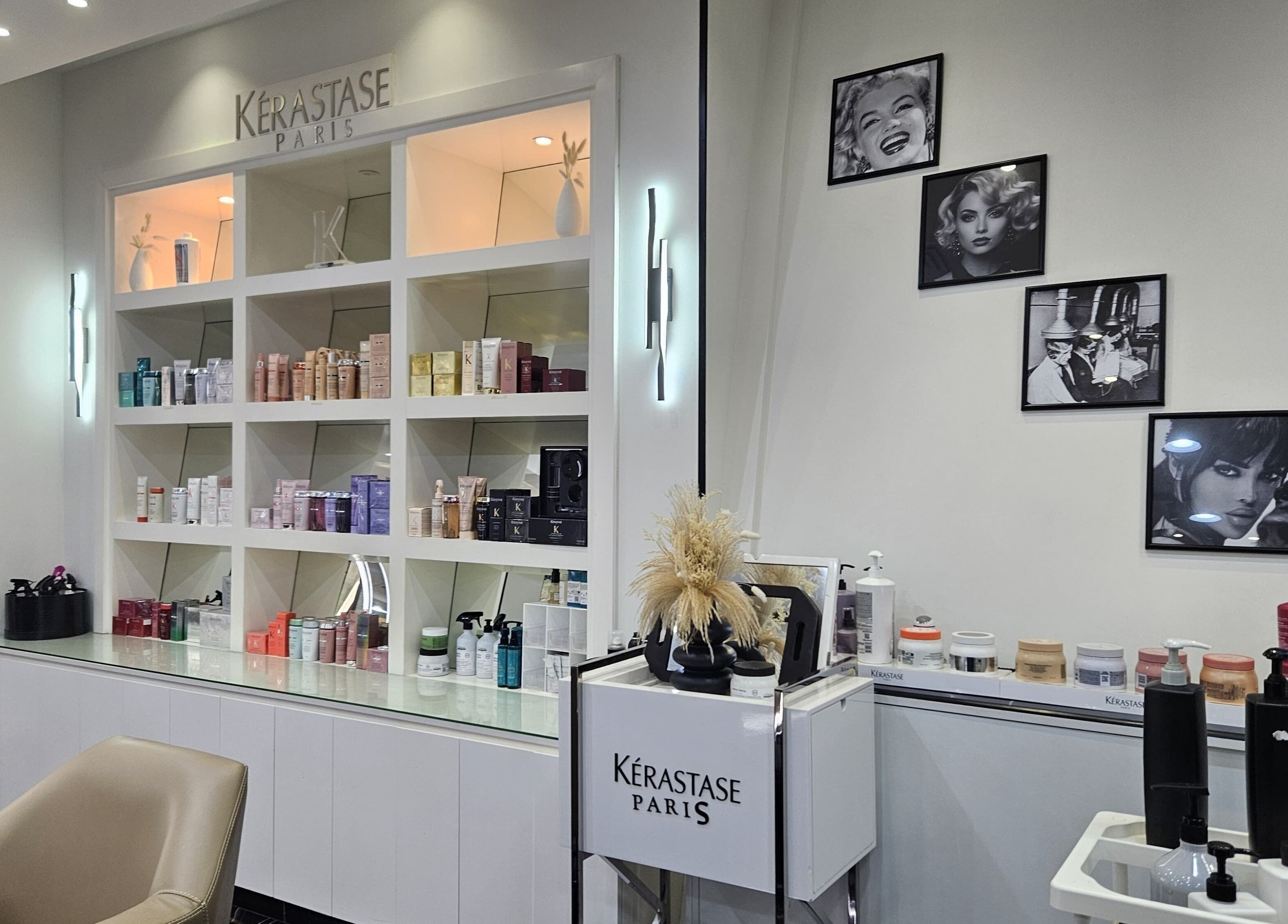 Chic product display at Top Style Ladies Saloon, Dubai, AE, featuring Kerastase Paris products.