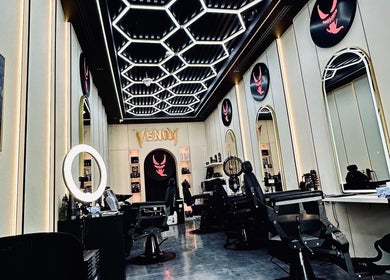 Luxurious interior of Venom Salon, Dubai, Dubai, AE with stylish chairs and modern decor.
