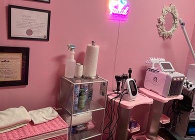 Bardon Beauty skincare setup with equipment and certificates in a pink room, Lauderdale-by-the-sea, Florida, US.