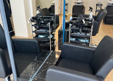 Stylish salon chairs at La Finesse Salon in Al Khobar, Eastern Province, SA showcasing luxury and comfort.