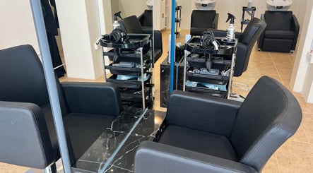 Stylish salon chairs at La Finesse Salon in Al Khobar, Eastern Province, SA showcasing luxury and comfort.