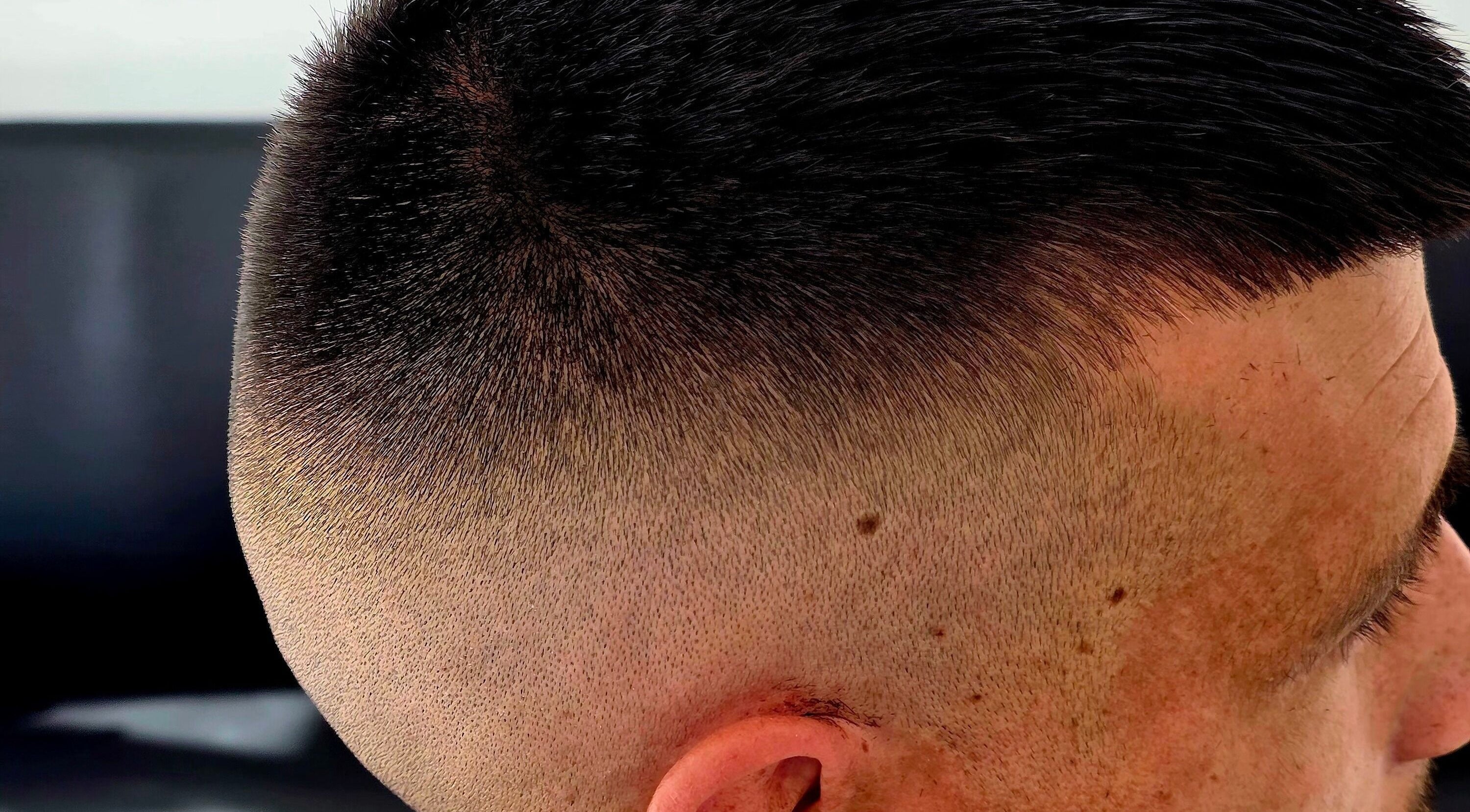 Close-up of a sleek hair fade at Fandvstudio in Macclesfield, England, GB.