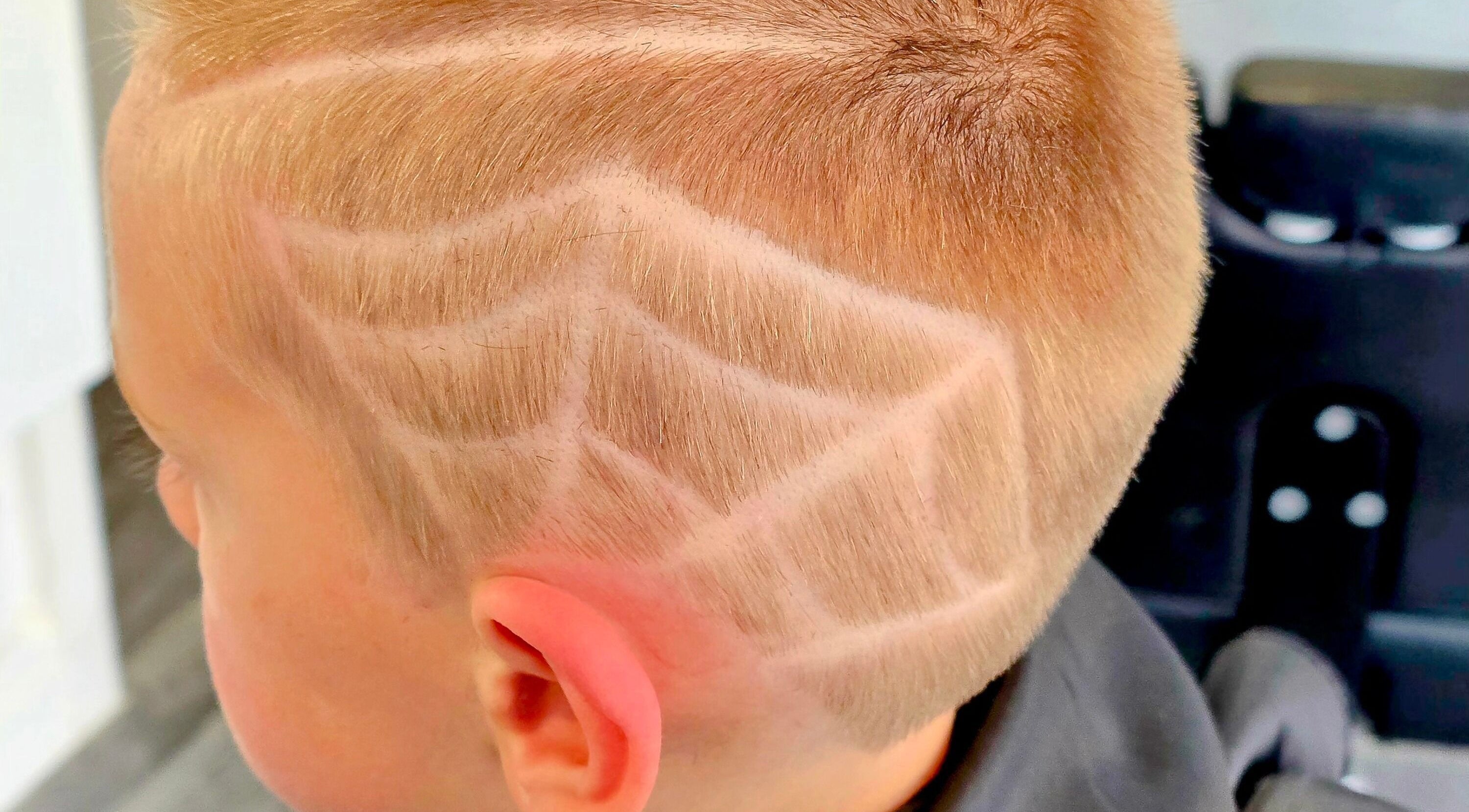 Intricate hair design at Fandvstudio, Macclesfield, England, GB showcasing expert barbering skills.