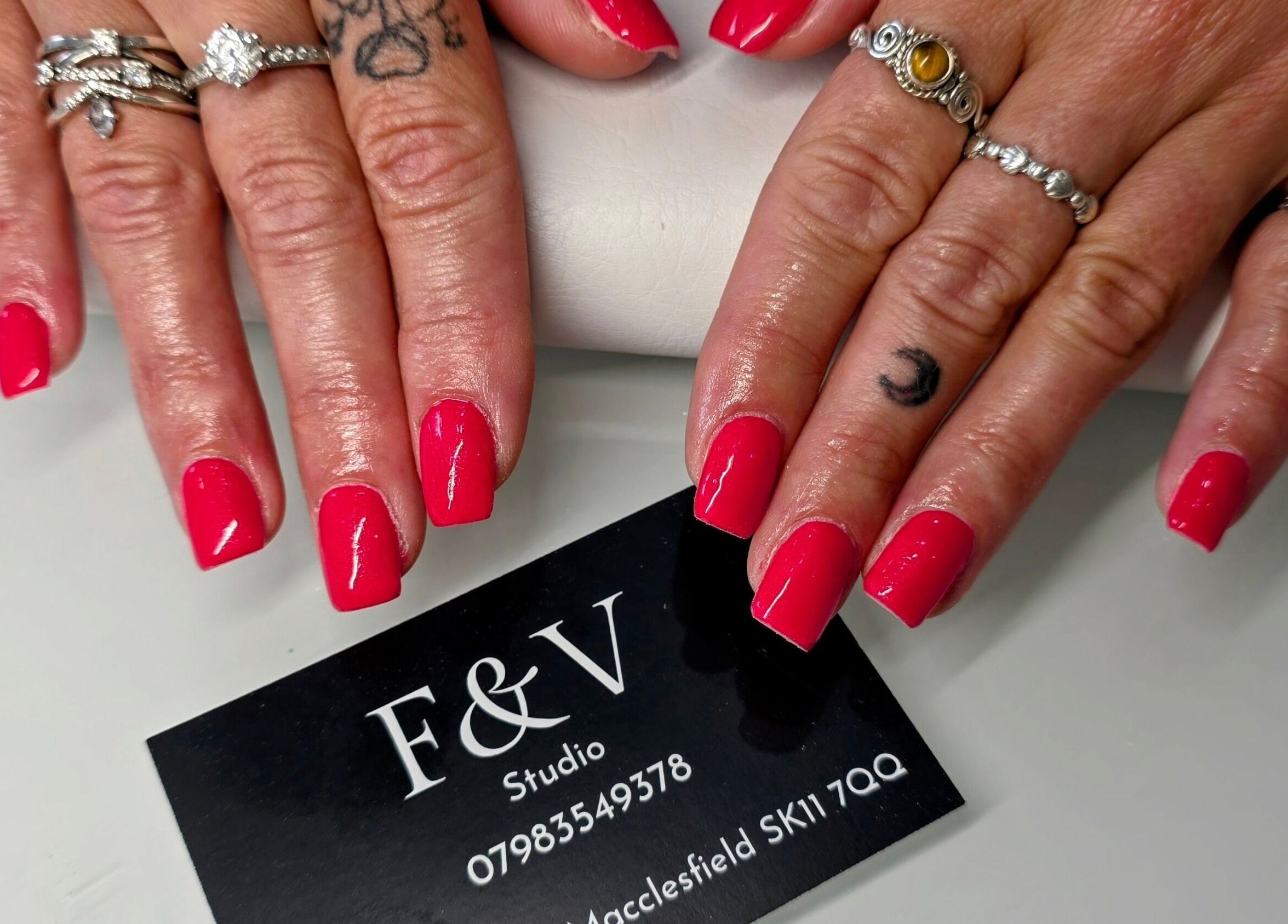 Stylish pink manicure by Fandvstudio in Macclesfield, England, GB, showcasing elegant nail art.