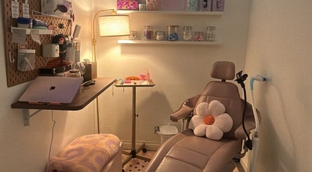 Cozy treatment room at Opal Glow & Co., Long Beach, California, offering a serene wellness experience.
