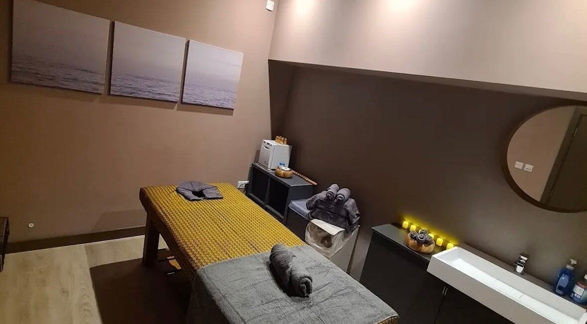 Relaxing massage room at Thai Massage By Woody, Kingston Upon Thames, England, GB, with ambient decor.