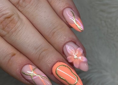Elegant floral nail art by By Kayleigh Marie in Gateshead, England, GB with gold accents and peach tones.