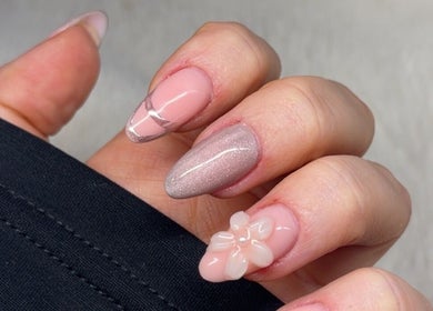 Elegant nail art with floral design by By Kayleigh Marie at Gateshead, England, GB offering unique style.