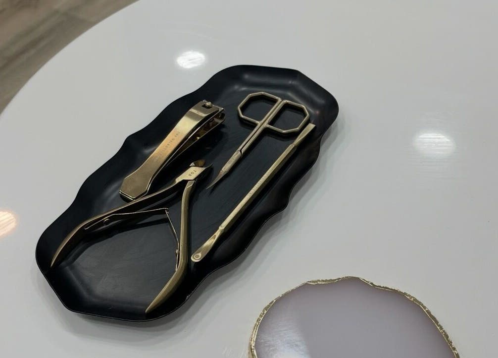 Nail care tools set on a sleek black tray at 108Nails, Gateshead, England, GB.