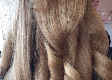 Elegant curls styled at Sunlux Tanning & Beauty in Preston, England, GB, showcasing expert hair design.