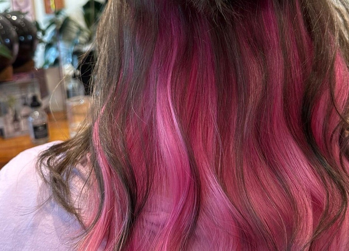 Vibrant pink hair color at Gracy RV salon in Yeerongpilly, Queensland, AU.