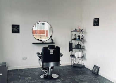 Modern chair and mirror setup in Eden At Jacks Barbers, Clipstone, England, GB.