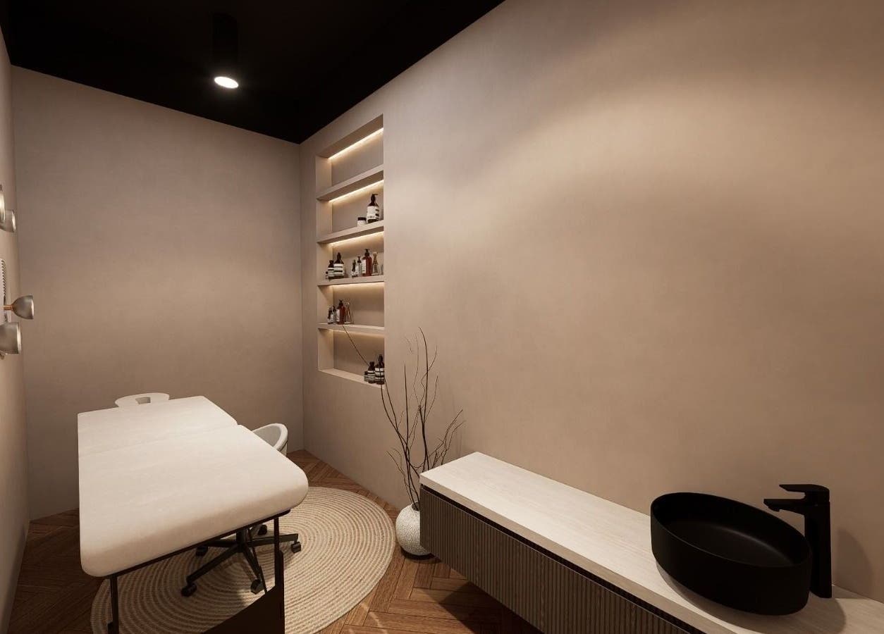 Elegant treatment room at Nisantasi Ladies Salon LLC, Dubai, AE with beige decor and modern fixtures.