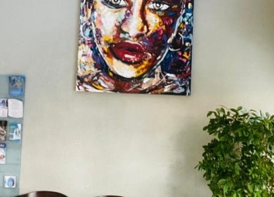 Welcoming area at Meltonian Mzimba Psychologist in Randburg, Gauteng, ZA with vibrant face painting.