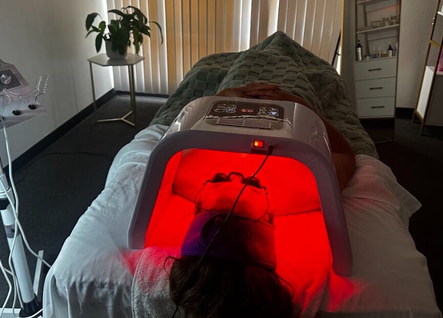 Relaxing LED light therapy at Lash & Glow by Oana in Newport Beach, California, US. A serene wellness session.