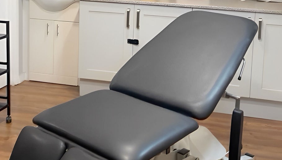 Comfortable treatment bed in Prism Aesthetics & Wellness, London, England, GB.