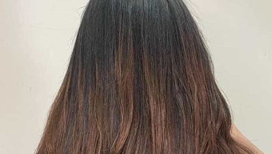 Silky brown hair styled at DK Salon in Kuala Lumpur, Wilayah Persekutuan Kuala Lumpur, MY.