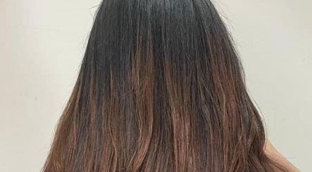 Silky brown hair styled at DK Salon in Kuala Lumpur, Wilayah Persekutuan Kuala Lumpur, MY.