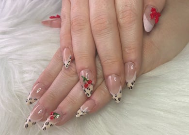 Stylish nail art with cherries and patterns at Mara's Beautyy Co, Tin Can Bay, Queensland, AU.