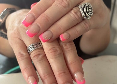 Stylish neon pink French manicure at Mara's Beautyy Co, Tin Can Bay, Queensland, AU.