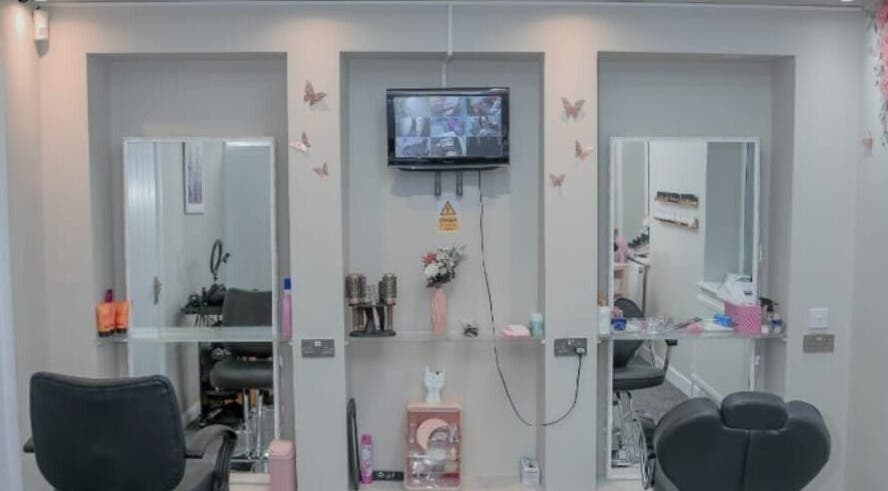 The Beauty Loft's inviting salon chairs and mirrors, creating a relaxing atmosphere in Bradford, England, GB.