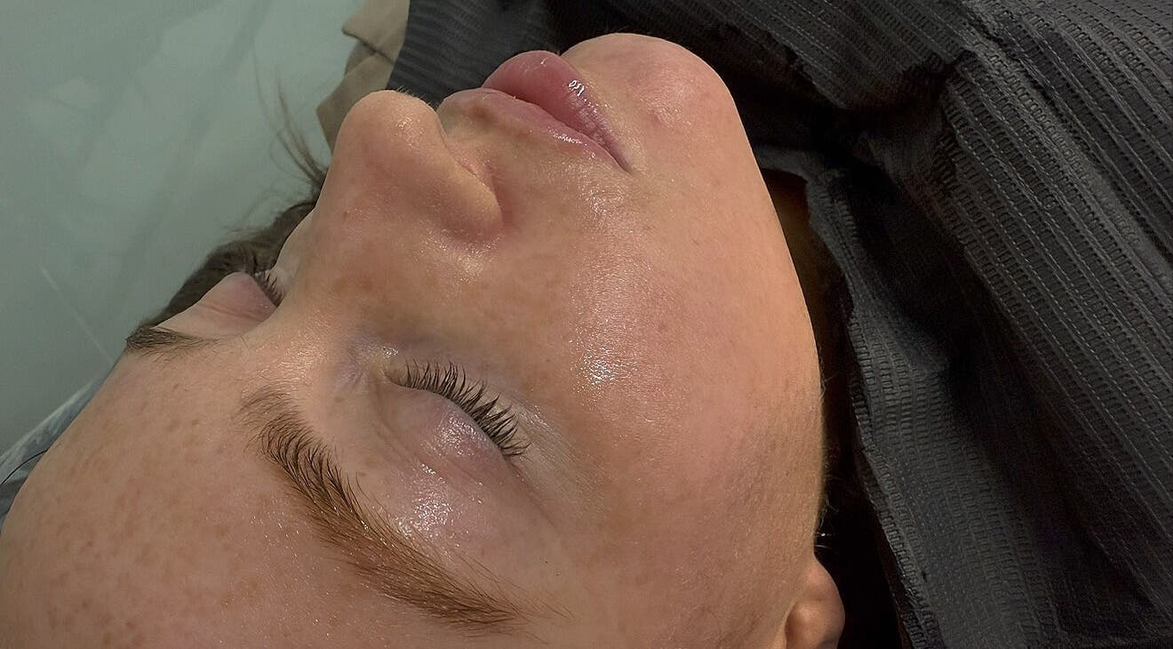 Relaxed woman post-facial treatment at Eyelash Envy Aesthetics, Barrow-in-Furness, England, GB.