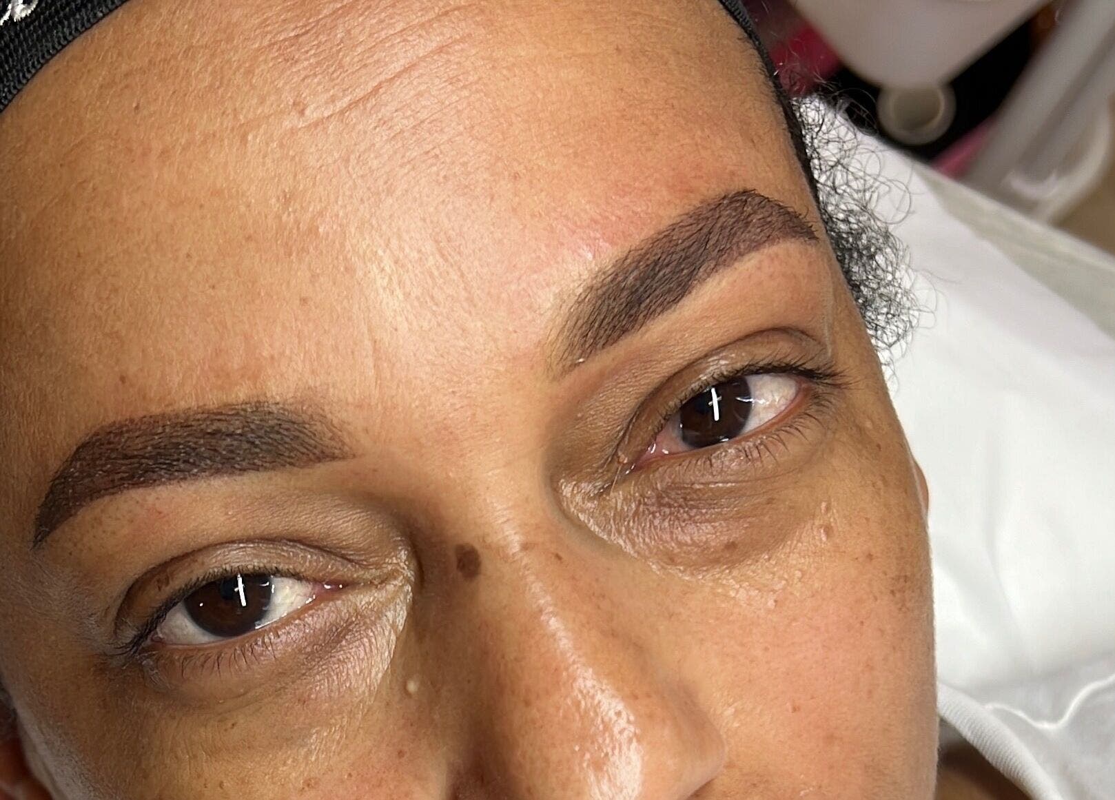 Freshly shaped eyebrows at Glamar brows studio, London, England, GB, highlighting precision and style.