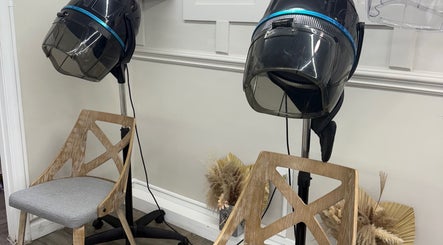 Hair drying chairs at Yocarys Hair & Latin, Gibsonton, Florida, US offering modern beauty services.