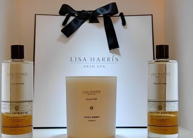 Luxury skincare and candle set from Lisa Harris Skin Science in Weybridge, England, GB, elegantly displayed.